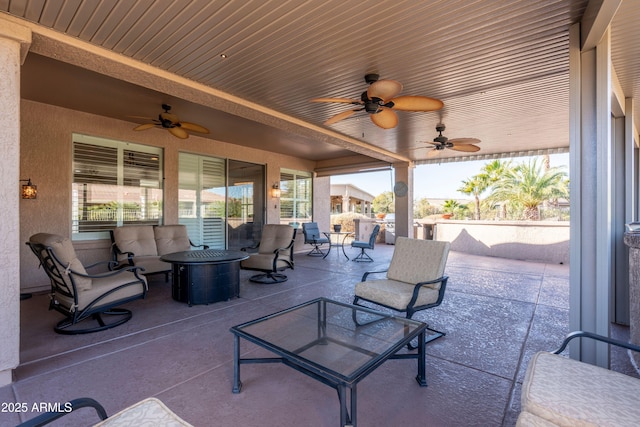 view of patio / terrace with an outdoor hangout area and ceiling fan