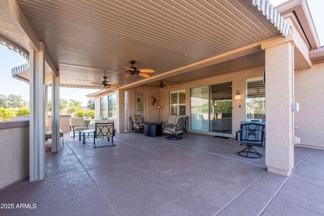 view of patio / terrace with ceiling fan