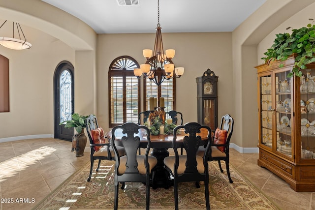 dining room with a chandelier