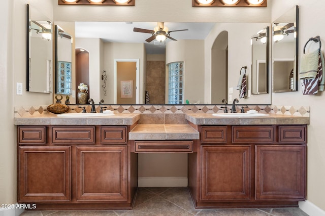 bathroom featuring tile patterned flooring and vanity