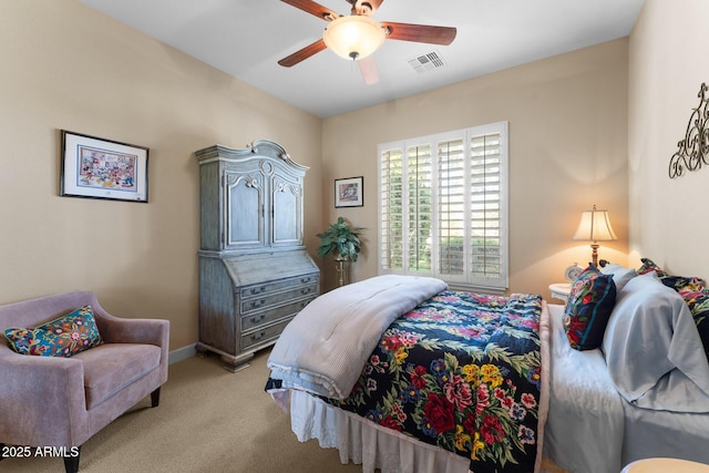 bedroom with light carpet and ceiling fan