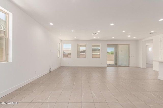 19434 S 212th Pl, Queen Creek, AZ 85142 - unfurnished room with healthy amount of natural light, recessed lighting, and light tile patterned floors