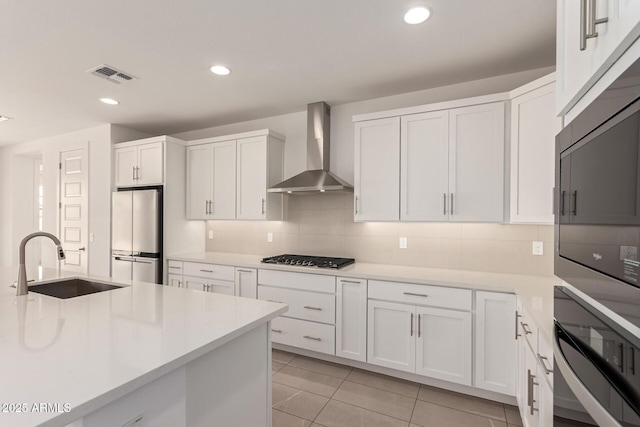 19434 S 212th Pl, Queen Creek, AZ 85142 - kitchen with wall chimney exhaust hood, stainless steel appliances, white cabinets, light countertops, and recessed lighting