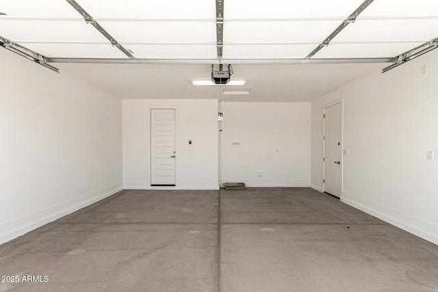 19434 S 212th Pl, Queen Creek, AZ 85142 - garage featuring a garage door opener and baseboards