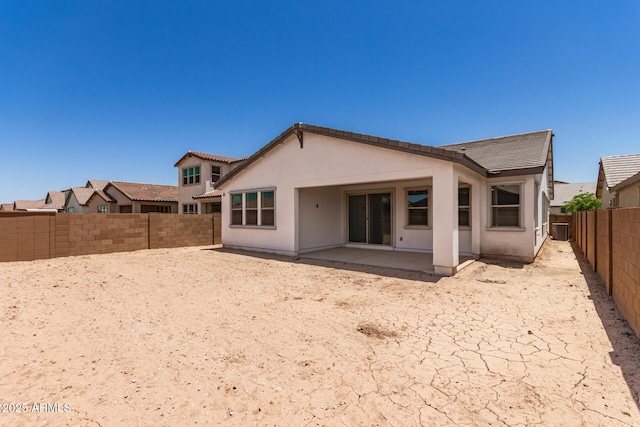 19434 S 212th Pl, Queen Creek, AZ 85142 - rear view of property with a fenced backyard, a patio area, stucco siding, and a tiled roof