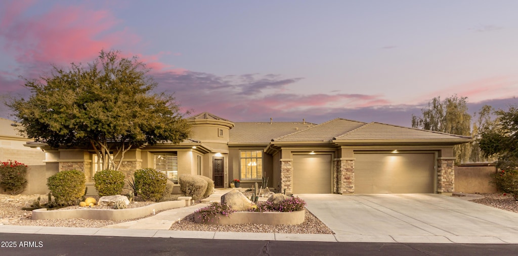 view of front of home with a garage