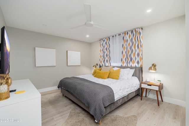bedroom featuring recessed lighting, wood finished floors, and baseboards