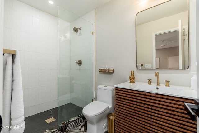full bath with tile patterned floors, a walk in shower, toilet, and vanity