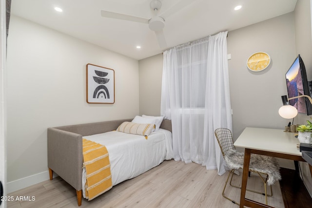 bedroom featuring recessed lighting, a ceiling fan, and wood finished floors
