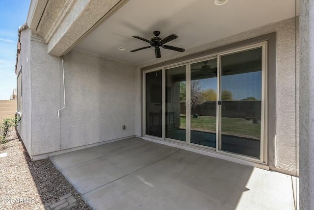 view of patio with ceiling fan