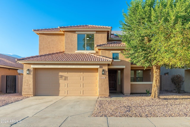 view of front of property featuring a garage