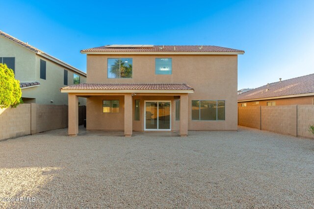 rear view of house with a patio area