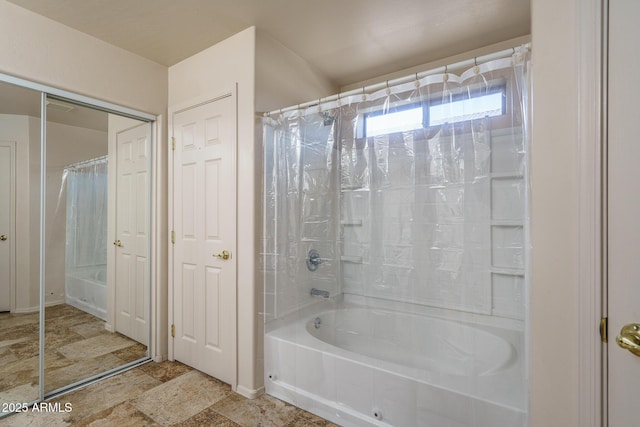 bathroom featuring shower / tub combo with curtain