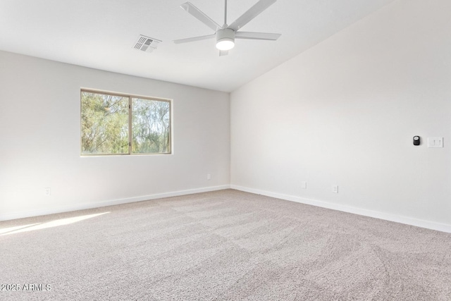 unfurnished room with vaulted ceiling, carpet flooring, and ceiling fan