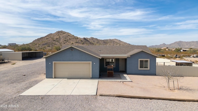 ranch-style home featuring a mountain view