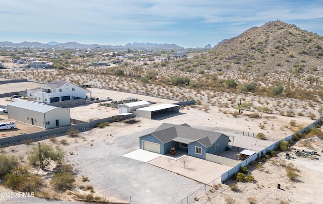 drone / aerial view featuring a mountain view