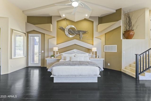 bedroom with ceiling fan and dark wood-type flooring