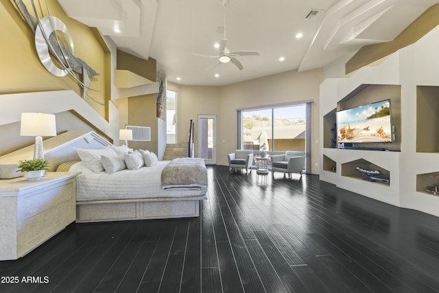 bedroom featuring ceiling fan and dark hardwood / wood-style flooring