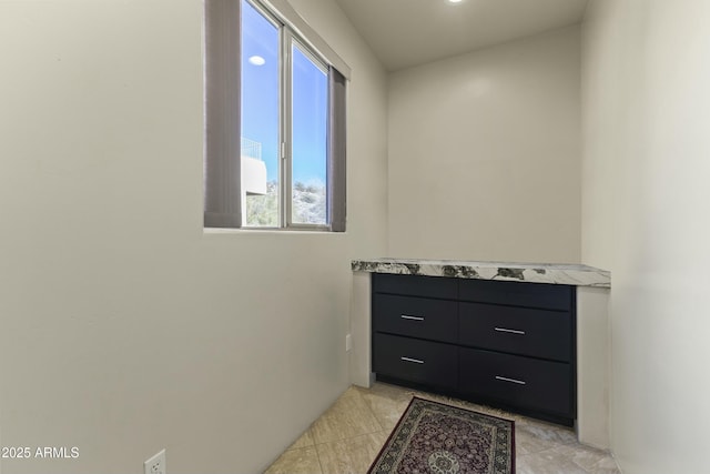 bathroom with tile patterned flooring