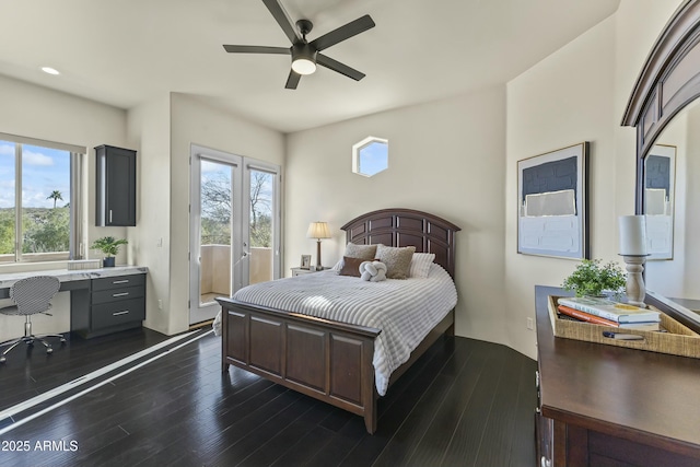 bedroom with ceiling fan and dark wood-type flooring