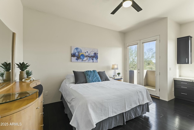 bedroom featuring ceiling fan and dark wood-type flooring