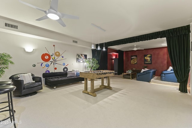 playroom with carpet flooring and ceiling fan