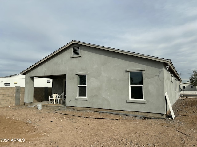 rear view of house with a patio area