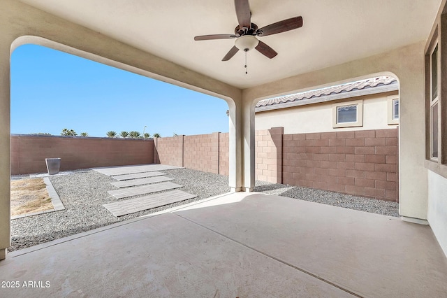 view of patio with ceiling fan