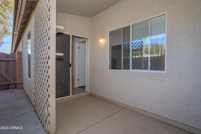 doorway to property with a patio