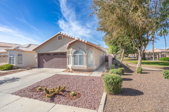 view of front of home with a garage