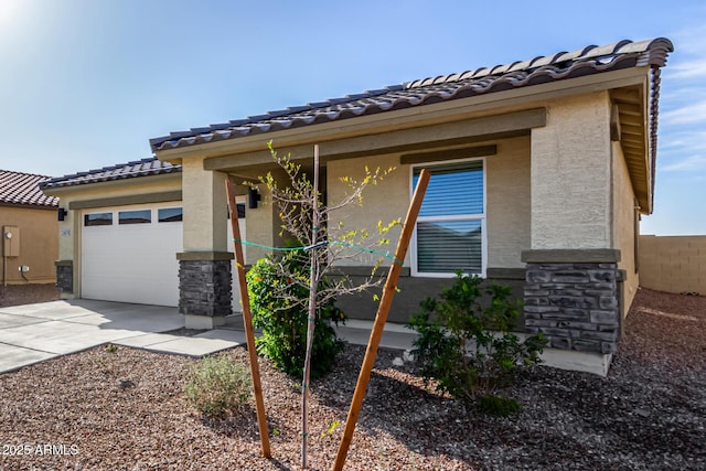 view of front of home featuring a garage