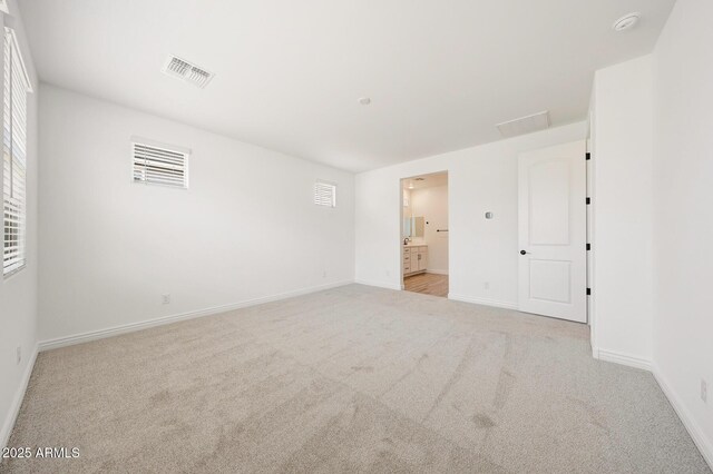 14742 W Lariat Trl, Surprise, AZ 85387 - empty room featuring carpet, baseboards, and a smoke detector