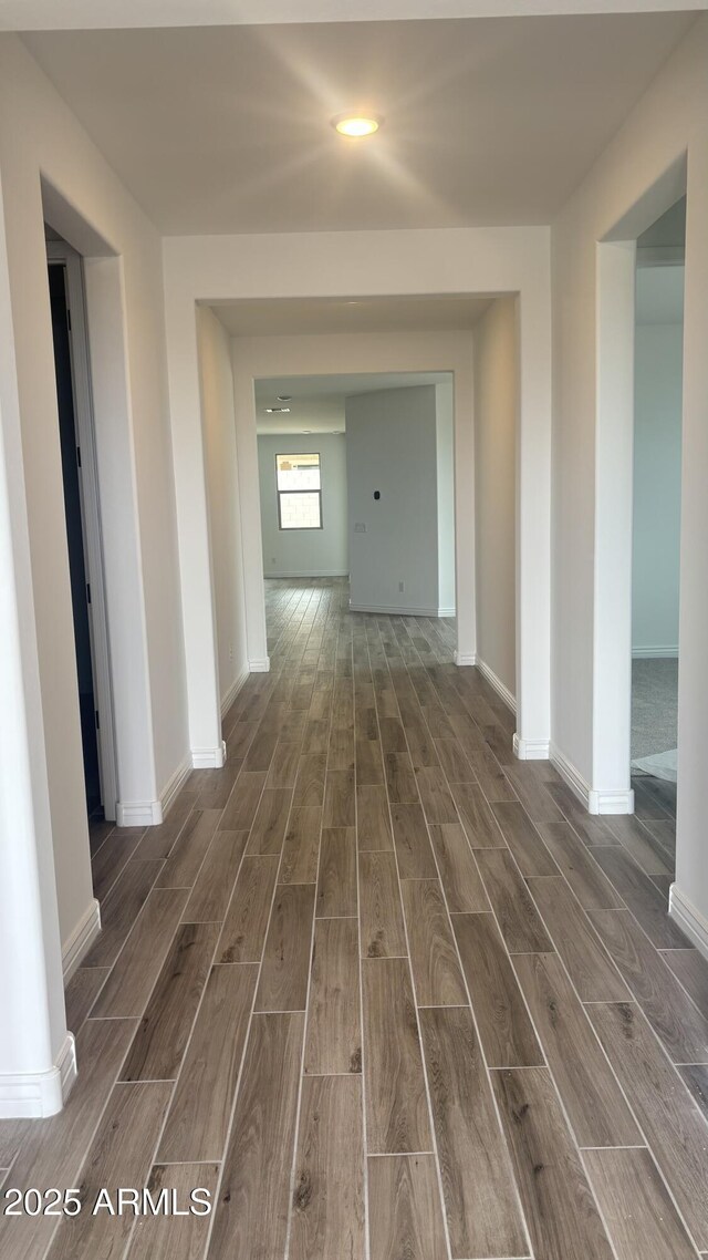 14742 W Lariat Trl, Surprise, AZ 85387 - hallway with wood finished floors and baseboards