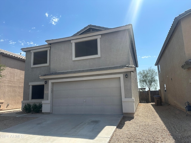 view of front property with a garage