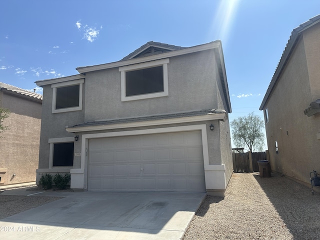 front of property featuring a garage