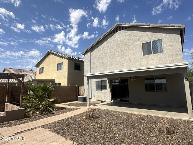 back of property featuring a patio