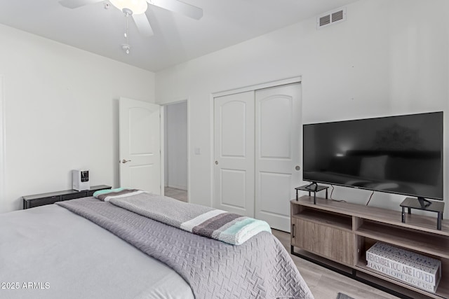 bedroom with a closet and ceiling fan