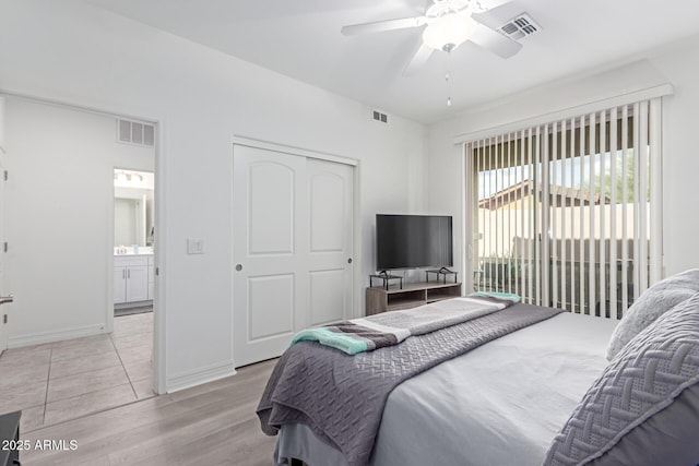 bedroom with ceiling fan, access to exterior, a closet, and light wood-type flooring