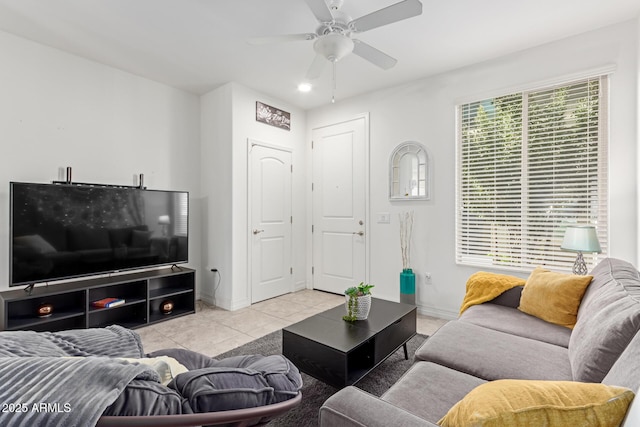 tiled living room with ceiling fan