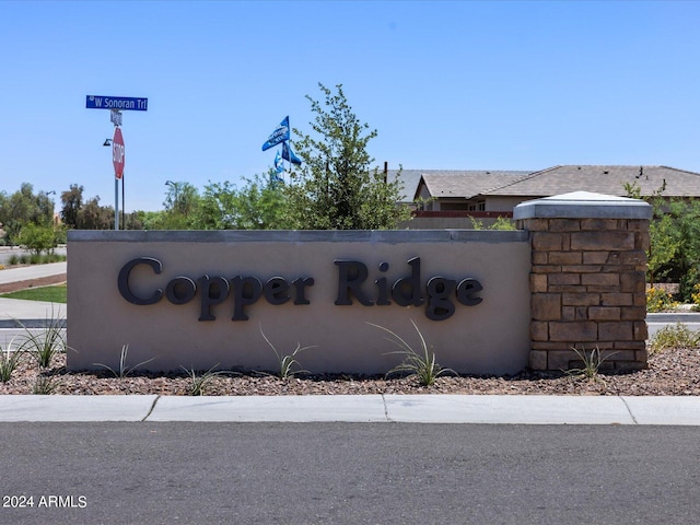 view of community sign