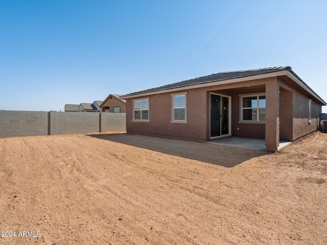 rear view of property with a patio