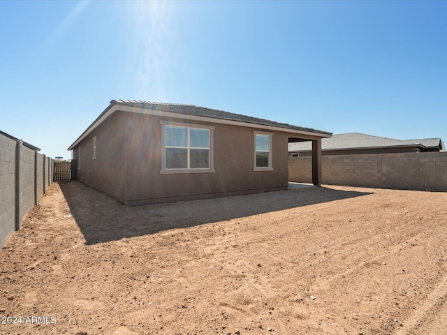 back of property with a patio area