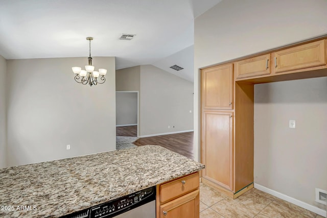 12441 W Windsor Blvd, Litchfield Park, AZ 85340 - kitchen featuring light stone countertops, lofted ceiling, a chandelier, baseboards, and light brown cabinets