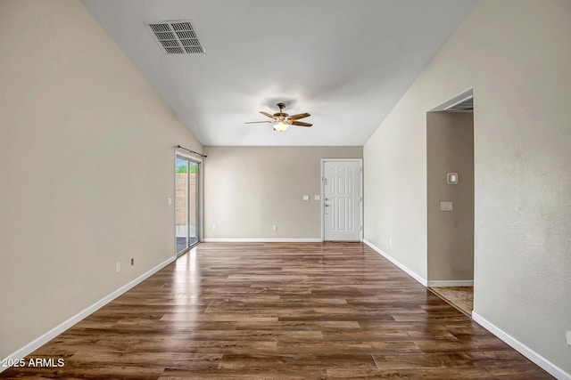 12441 W Windsor Blvd, Litchfield Park, AZ 85340 - empty room with ceiling fan, wood finished floors, baseboards, and vaulted ceiling