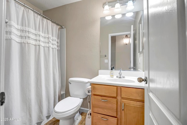 12441 W Windsor Blvd, Litchfield Park, AZ 85340 - bathroom featuring vanity, toilet, and a textured wall