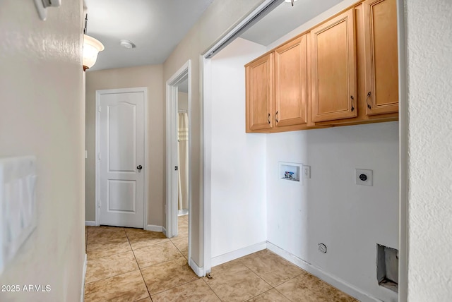 12441 W Windsor Blvd, Litchfield Park, AZ 85340 - laundry area with hookup for a gas dryer, cabinet space, light tile patterned floors, and washer hookup