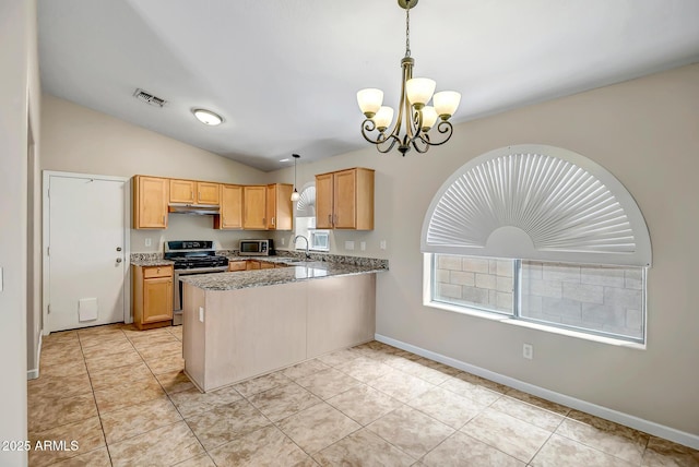 12441 W Windsor Blvd, Litchfield Park, AZ 85340 - kitchen featuring appliances with stainless steel finishes, a chandelier, a peninsula, a sink, and vaulted ceiling