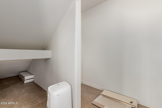 bathroom with vaulted ceiling