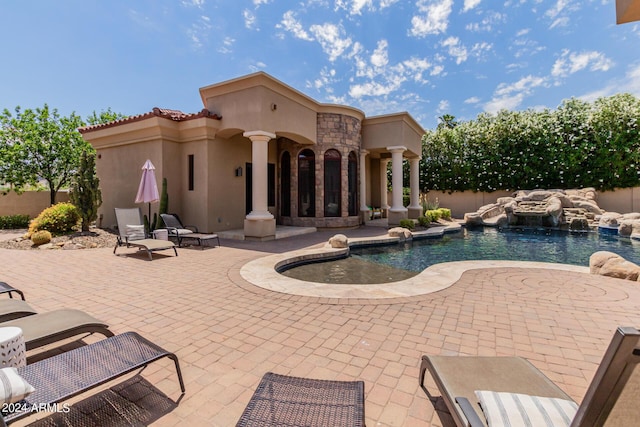 view of swimming pool featuring a patio area