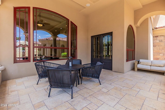 view of patio with outdoor lounge area and french doors